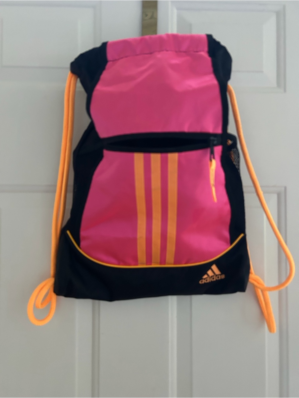 adidas Pink and Black Drawstring Backpack with Orange Accents